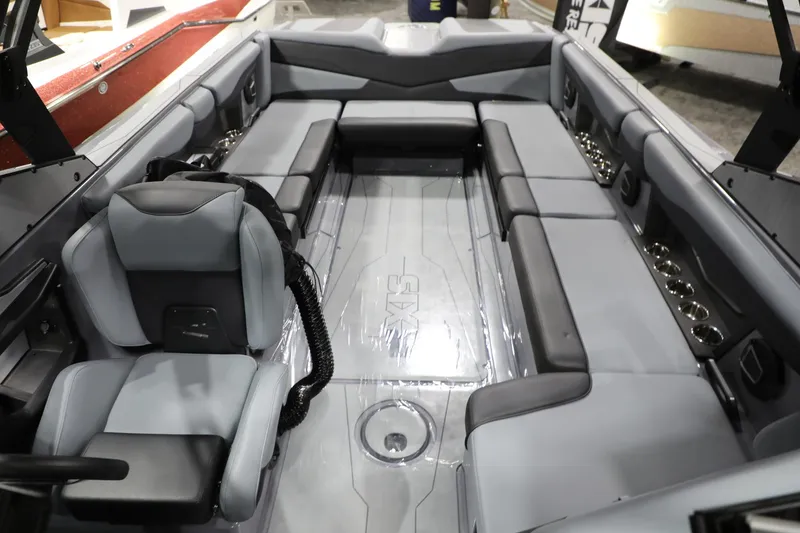 Slide: The Image of 2024 Axis T250 boat interior with spacious seating and modern design. - 11
