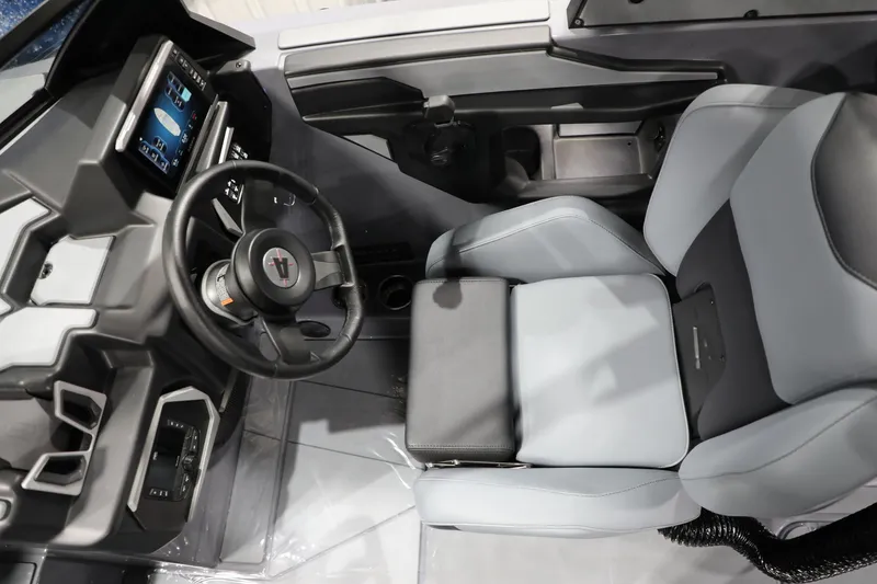 Slide: The Image of 2024 Axis T250 boat interior with modern dashboard and comfortable seating. - 12