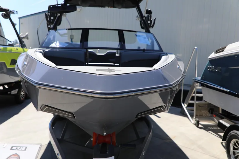 Slide: The Image of 2024 Axis T250 boat displayed outdoors, showcasing sleek design and modern features. - 3