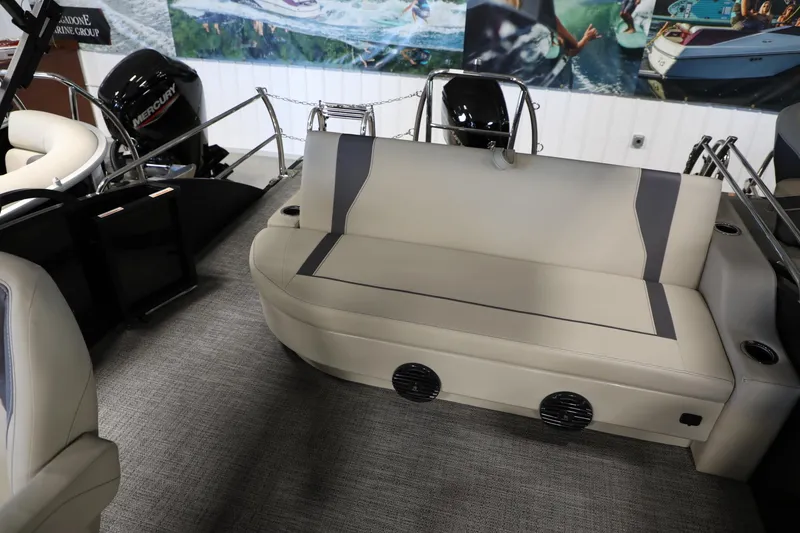 Slide: The Image of 2024 Barletta ARIA A20QC boat interior with beige seating and Mercury engine. - 14