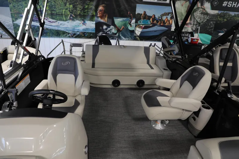 Slide: The Image of 2024 Barletta ARIA A20QC pontoon boat interior with plush seating and modern design. - 5