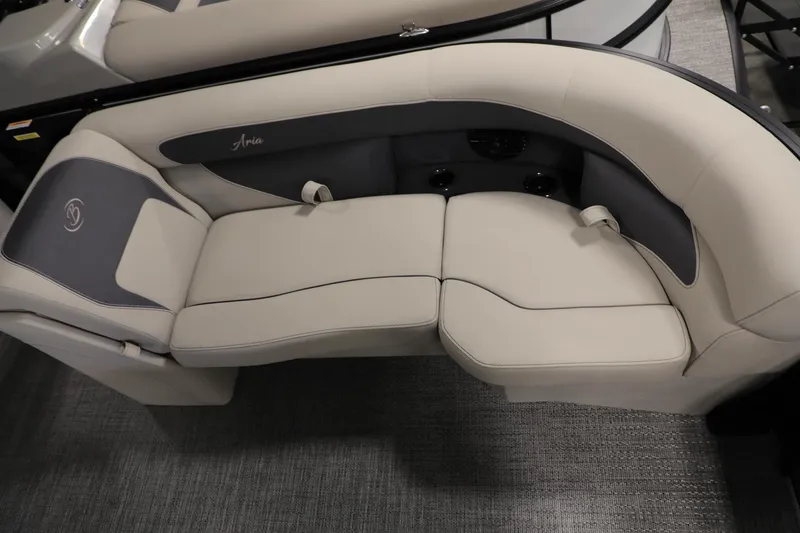 Slide: The Image of 2024 Barletta ARIA A20QC boat interior seating, featuring elegant beige upholstery. - 7