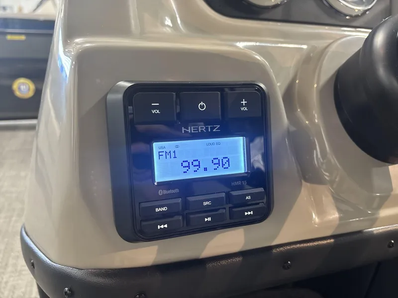 Slide: The Image of 2024 Barletta ARIA 20UC boat stereo system displaying FM radio frequency 99.90. - 13