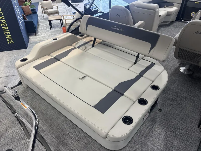 Slide: The Image of 2024 Barletta ARIA 20UC boat interior with comfortable seating and cup holders. - 18