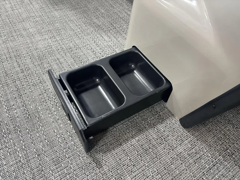 Slide: The Image of 2024 Barletta ARIA 20UC boat with dual cup holders on textured flooring. - 21