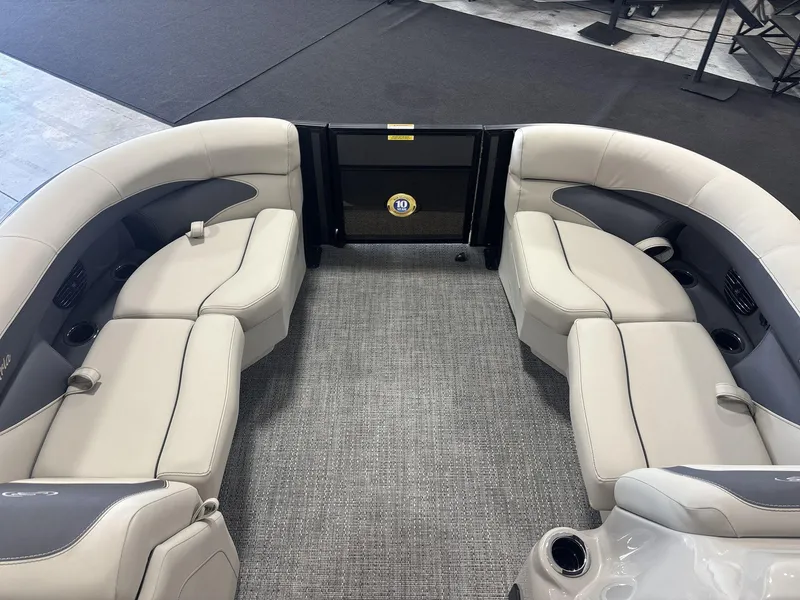 Slide: The Image of 2024 Barletta ARIA 20UC pontoon boat interior with plush seating and modern design. - 7