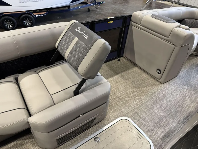 Slide: The Image of 2023 Barletta Lusso 25MA boat interior with luxurious seating and modern design. - 12