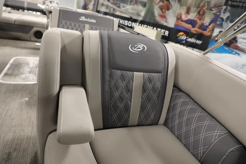 Slide: The Image of 2023 Barletta L25UEA boat interior with luxurious seating and elegant stitching. - 10