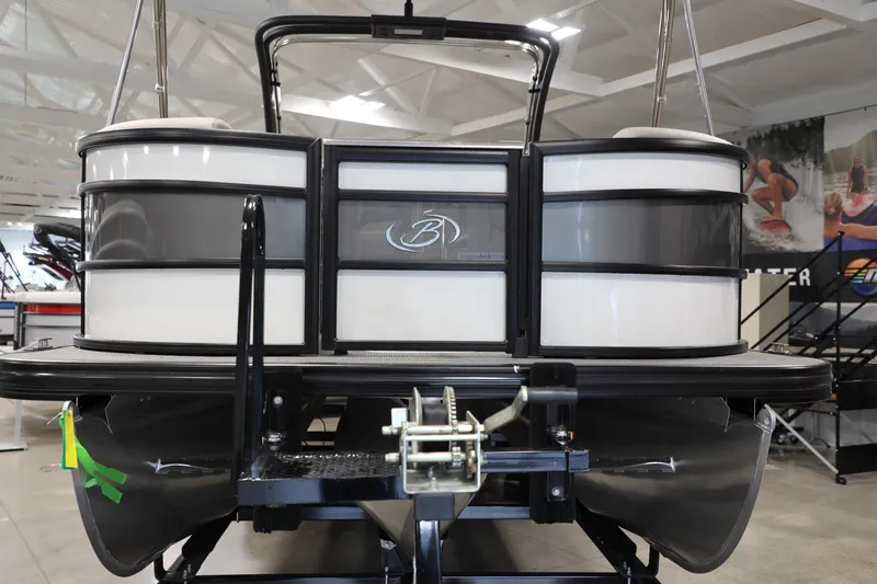 Slide: The Image of 2023 Barletta L25UEA pontoon boat displayed in showroom. - 12