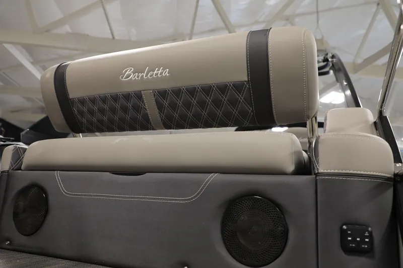 Slide: The Image of 2023 Barletta L25UEA boat seat with elegant stitching and integrated speakers. - 13