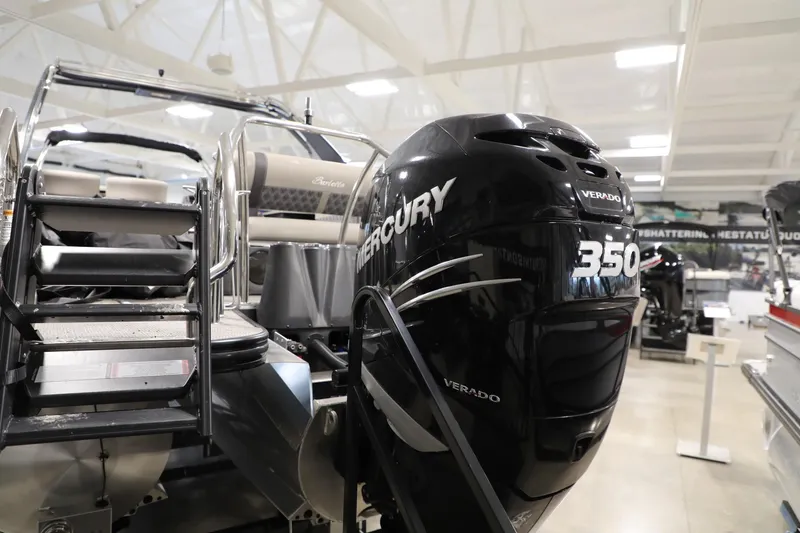 Slide: The Image of 2023 Barletta L25UEA boat with Mercury 350 Verado engine in showroom. - 4