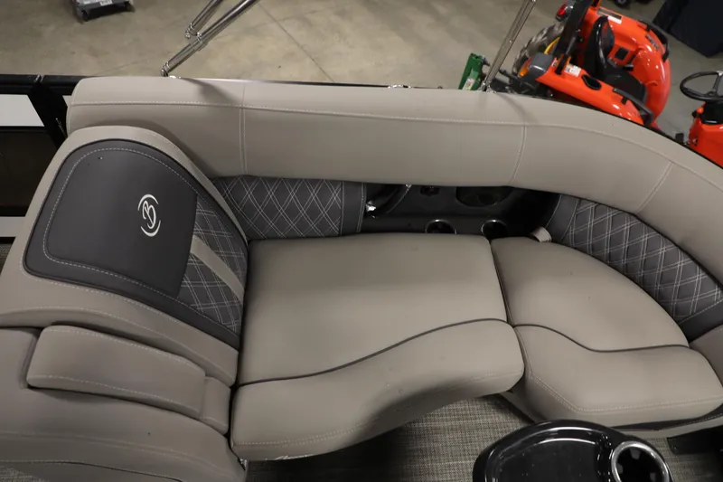 Slide: The Image of 2023 Barletta L25UEA boat interior with luxurious gray seating and cup holders. - 8
