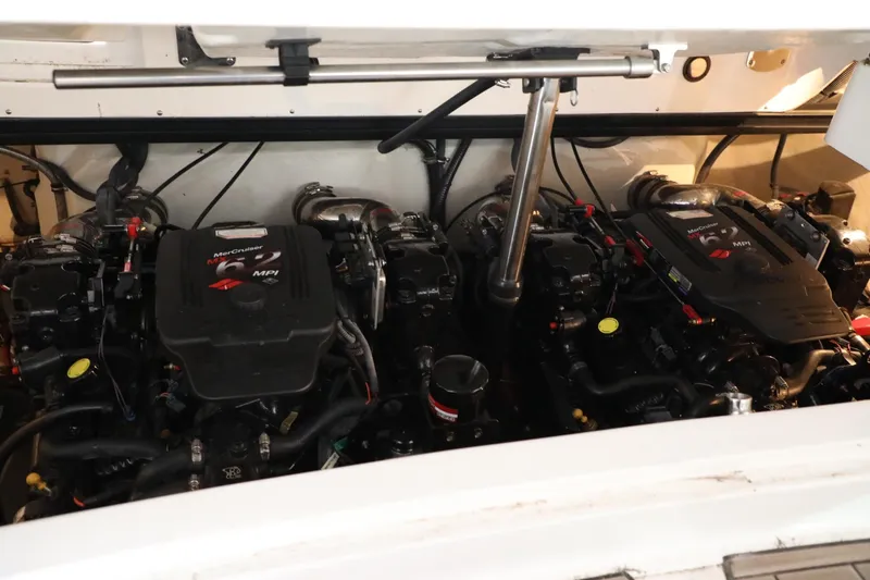 Slide: The Image of 2006 Cobalt 323 boat engine compartment with twin MerCruiser 6.2 MPI engines. - 18