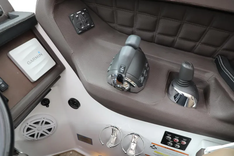 Slide: The Image of Control panel of a 2016 Cobalt A40 boat with Garmin navigation system. - 11