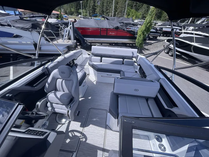 Slide: The Image of 2024 Cobalt R4 boat interior with luxurious seating and modern design. - 10