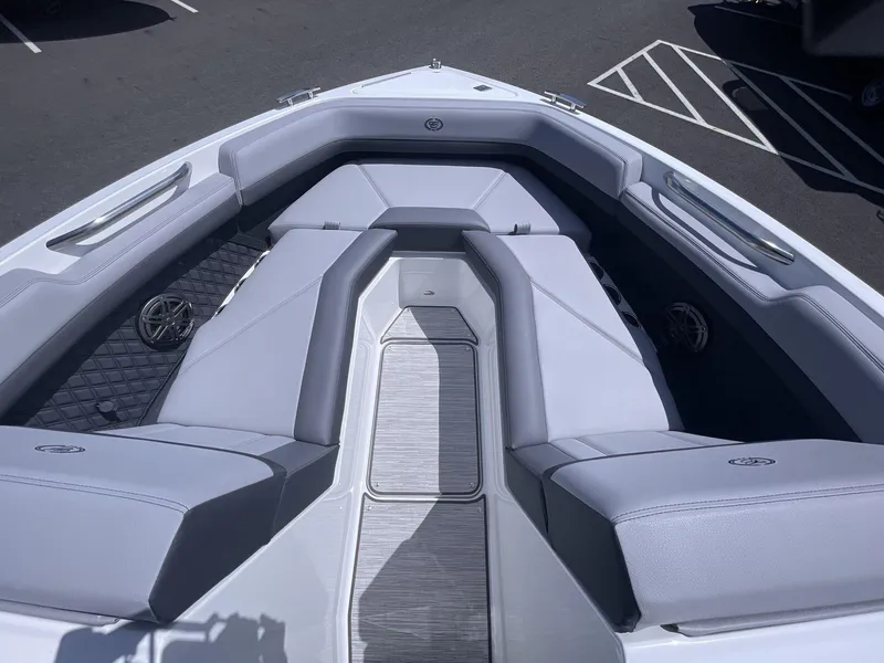 Slide: The Image of 2024 Cobalt R4 boat interior with sleek gray seating and modern design. - 8