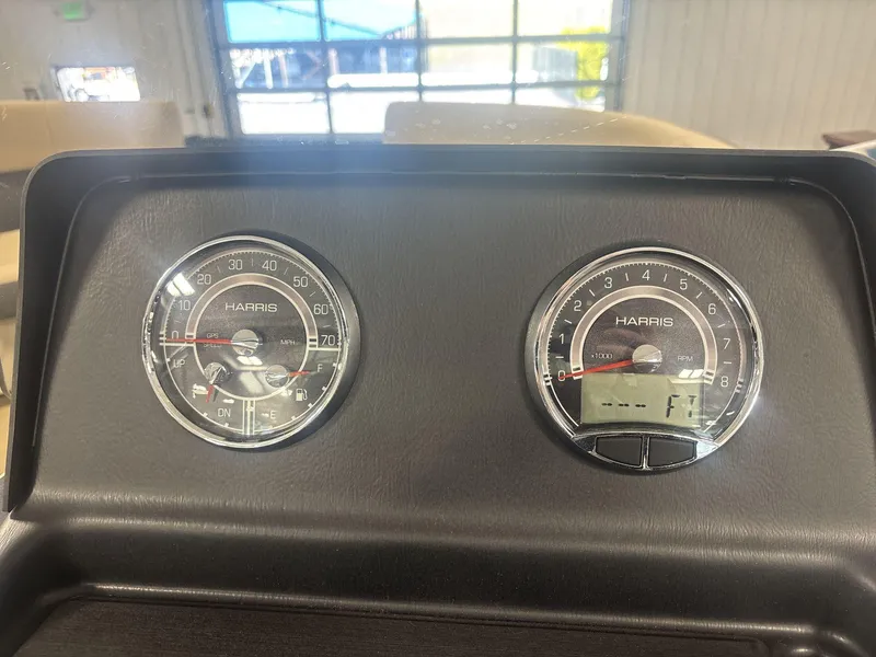 Slide: The Image of Dashboard of 2024 Harris Cruiser 210 with speedometer and RPM gauges. - 15
