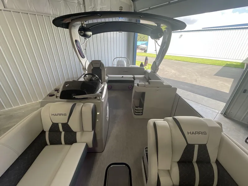 Slide: The Image of 2023 Harris Grand Mariner 250 interior with luxurious seating and modern design. - 10
