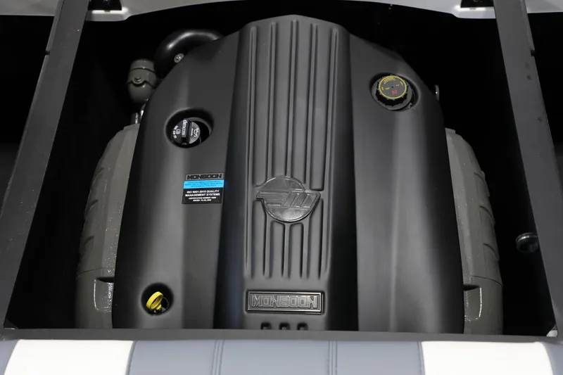 Slide: The Image of 2024 Malibu 21 LX-R Monsoon engine close-up, showcasing sleek design and branding. - 3