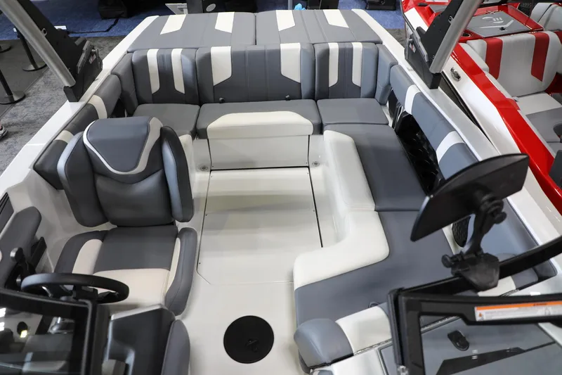 Slide: The Image of 2024 Malibu 21 LX-R boat interior with gray and white seating arrangement. - 8
