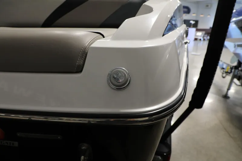 Slide: The Image of 2014 Malibu 24MXZ boat interior detail with sleek design and upholstery. - 16