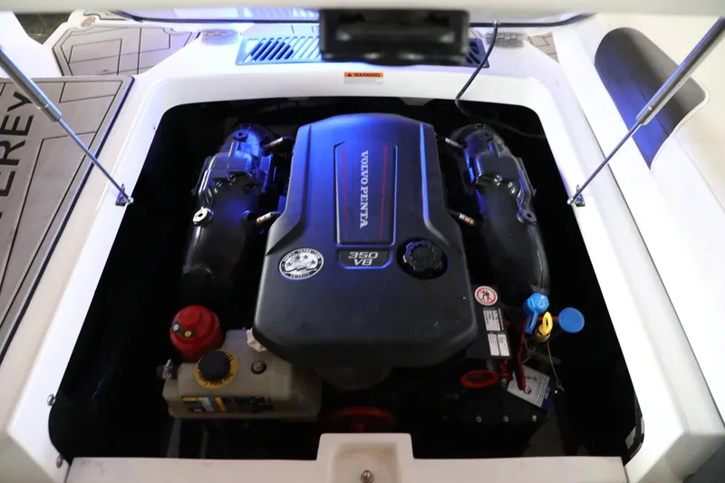 Slide: The Image of Engine compartment of a 2018 Monterey 238 SS Surf boat with Volvo Penta 350 V8 engine. - 12