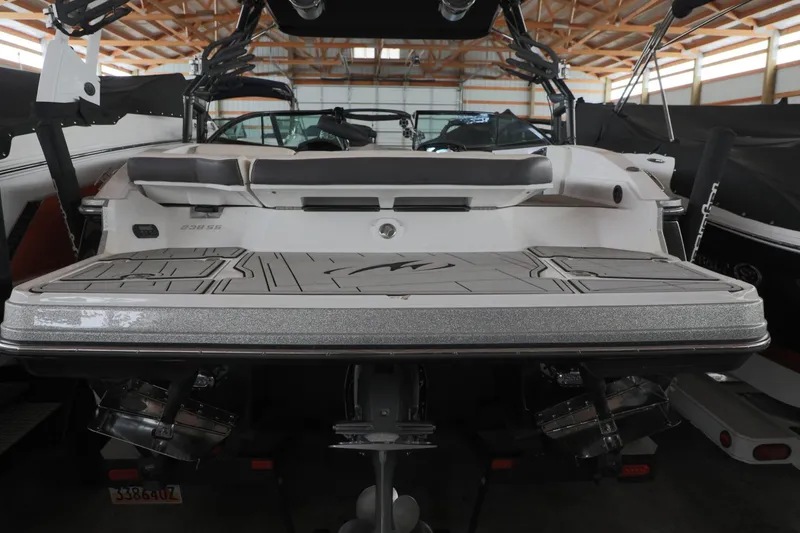 Slide: The Image of 2018 Monterey 238 SS Surf boat, rear view in storage facility. - 14