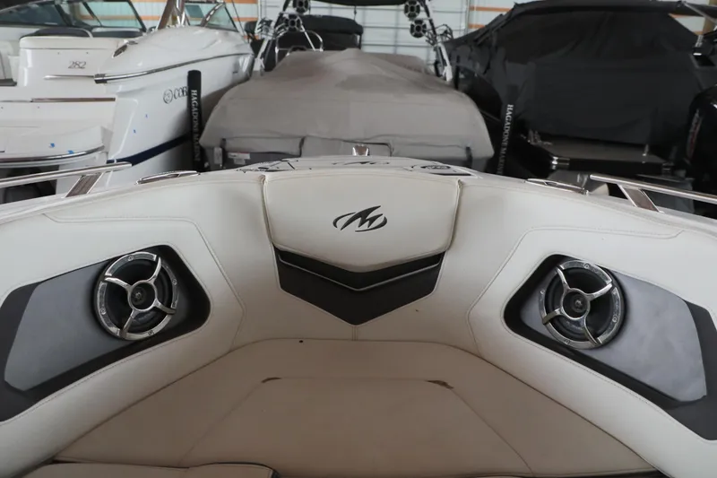 Slide: The Image of 2018 Monterey 238 SS Surf boat interior with speakers and logo. - 5