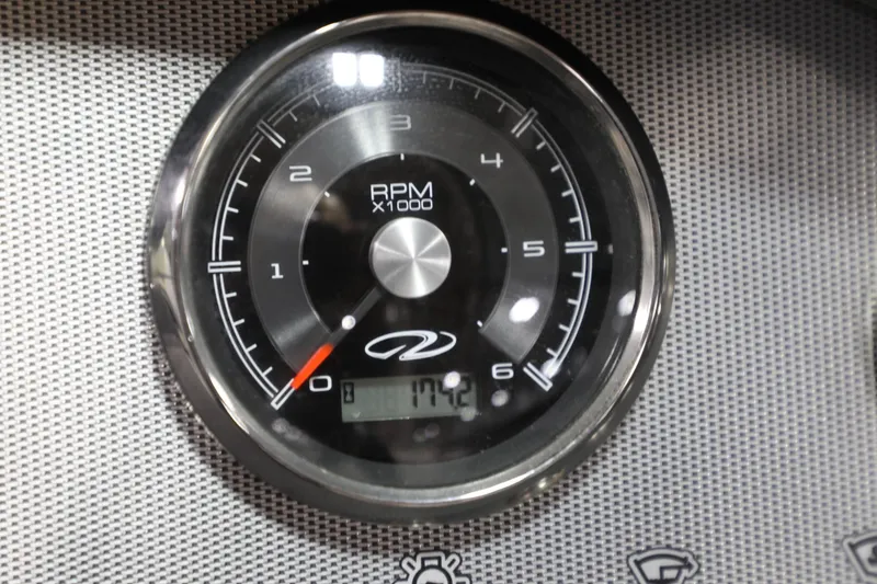 Slide: The Image of Close-up of the RPM gauge on a 2017 Regal 2800 Bowrider boat. - 11