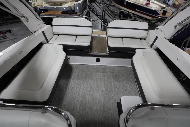 Slide: The Image of Interior of a 2017 Regal 2800 Bowrider boat with spacious seating. - 21