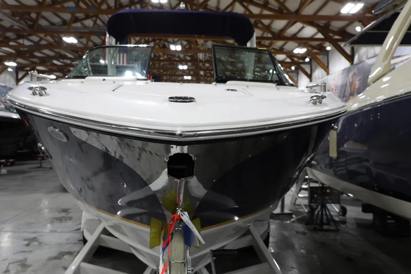 Slide: The Image of 2017 Regal 2800 Bowrider boat in indoor storage facility. - 5