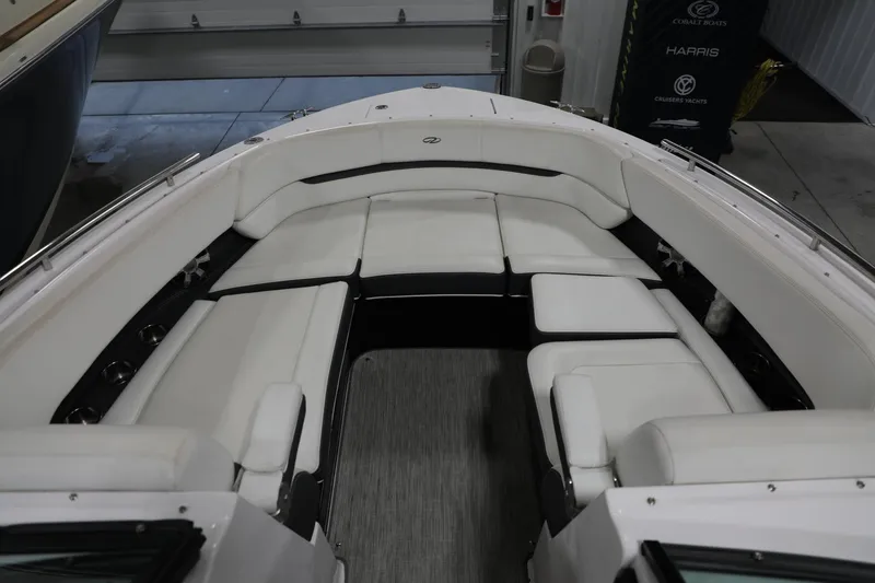 Slide: The Image of 2017 Regal 2800 Bowrider interior with white seating and spacious layout. - 8