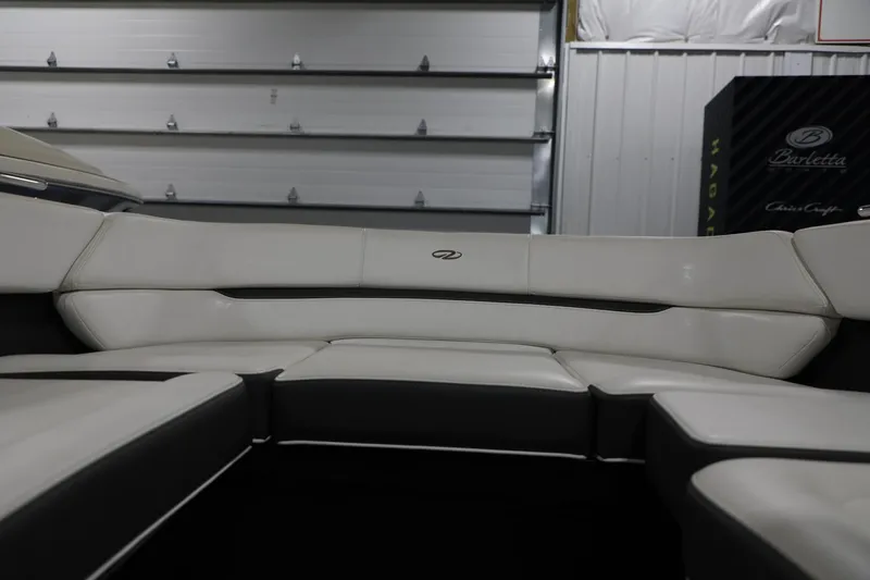 Slide: The Image of 2017 Regal 2800 Bowrider interior seating in a garage. - 9