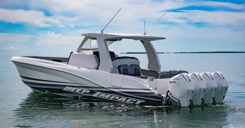 The Image of 2024 Deep Impact 369 boat with quad outboard engines on calm water. - 0
