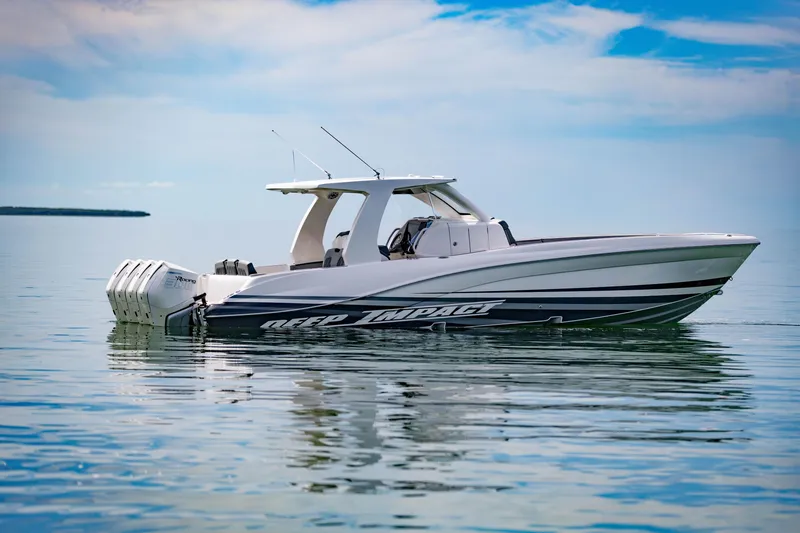 Slide: The Image of 2024 Deep Impact 369 Deep Impact boat on calm water. - 13