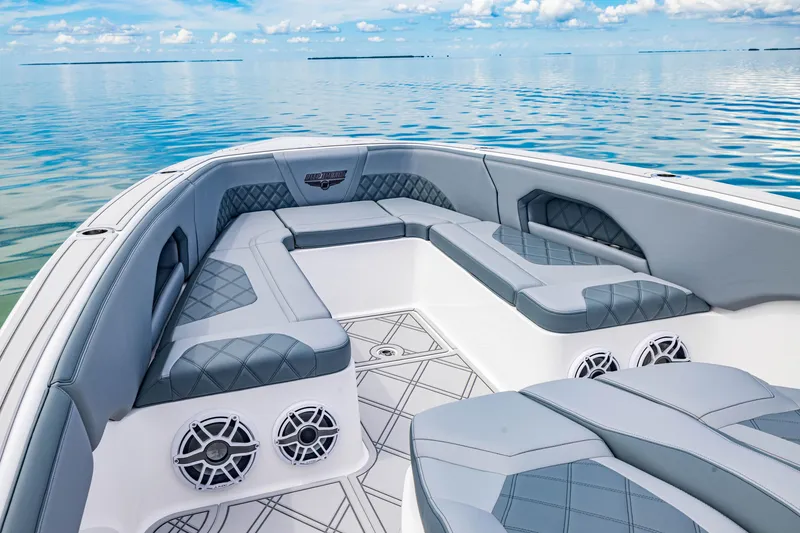 Slide: The Image of 2024 Deep Impact 369 boat interior with luxurious seating and ocean view. - 14