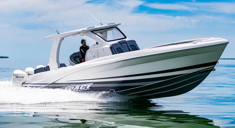 Slide: The Image of 2024 Deep Impact 369 boat cruising on calm water. - 19