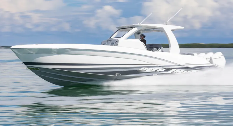 Slide: The Image of 2024 Deep Impact 369 boat cruising on water. - 2