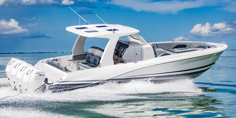 Slide: The Image of 2024 Deep Impact 369 Deep Impact boat cruising on open water. - 20