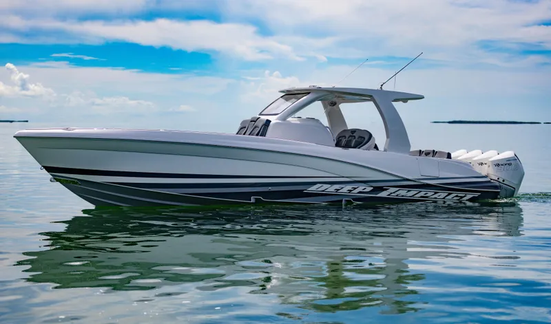 Slide: The Image of 2024 Deep Impact 369 Deep Impact boat on calm water. - 3