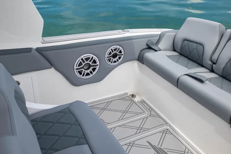 Slide: The Image of 2024 Deep Impact 369 boat interior with luxury seating and marine speakers. - 32