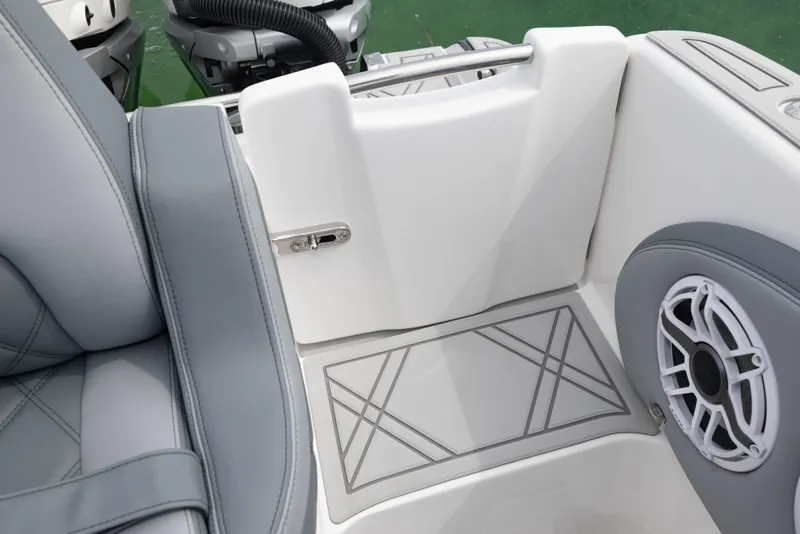 Slide: The Image of 2024 Deep Impact 369 boat interior with gray seating and speaker. - 33