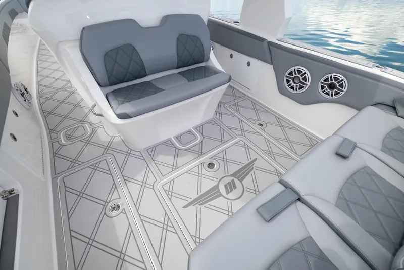 Slide: The Image of 2024 Deep Impact 369 boat interior with cushioned seating and stylish flooring. - 36