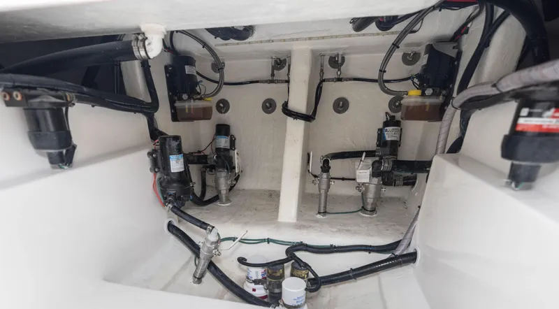 Slide: The Image of 2024 Deep Impact 369 Deep Impact engine compartment with wiring and components. - 37