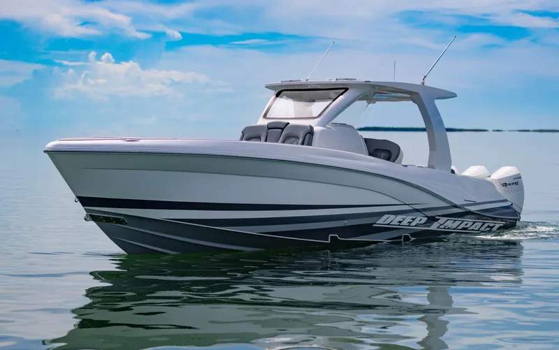 Slide: The Image of 2024 Deep Impact 369 boat cruising on calm waters under a clear blue sky. - 4