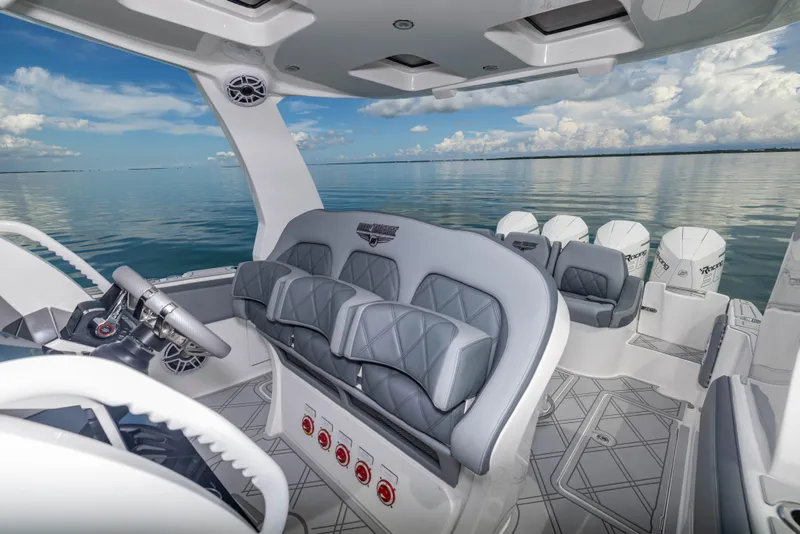Slide: The Image of 2024 Deep Impact 369 Deep Impact boat interior with luxurious seating and ocean view. - 41
