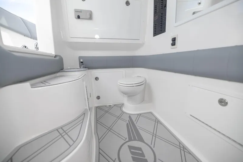 Slide: The Image of 2024 Deep Impact 369 boat interior bathroom with modern fixtures and sleek design. - 47