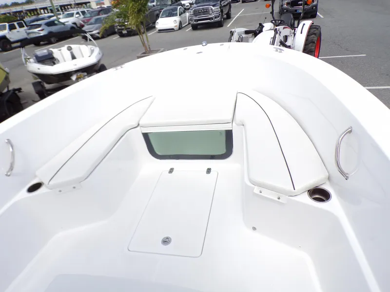 Slide: The Image of 2023 Wellcraft 202 Fisherman boat interior with seating and storage compartments. - 14