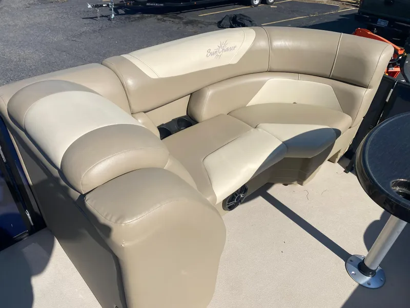 Slide: The Image of 2022 SunChaser Geneva 22 LR DH boat with beige and cream seating. - 14