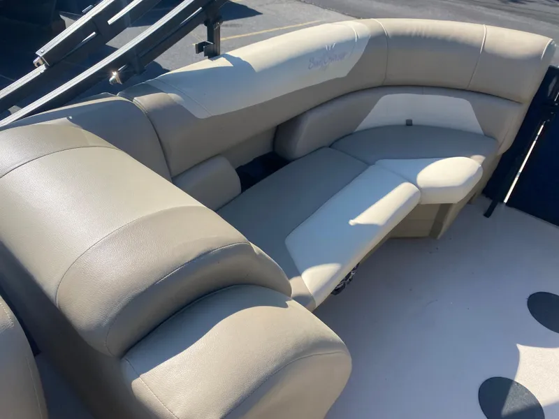 Slide: The Image of 2022 SunChaser Geneva 22 LR DH boat interior seating in beige and white. - 15